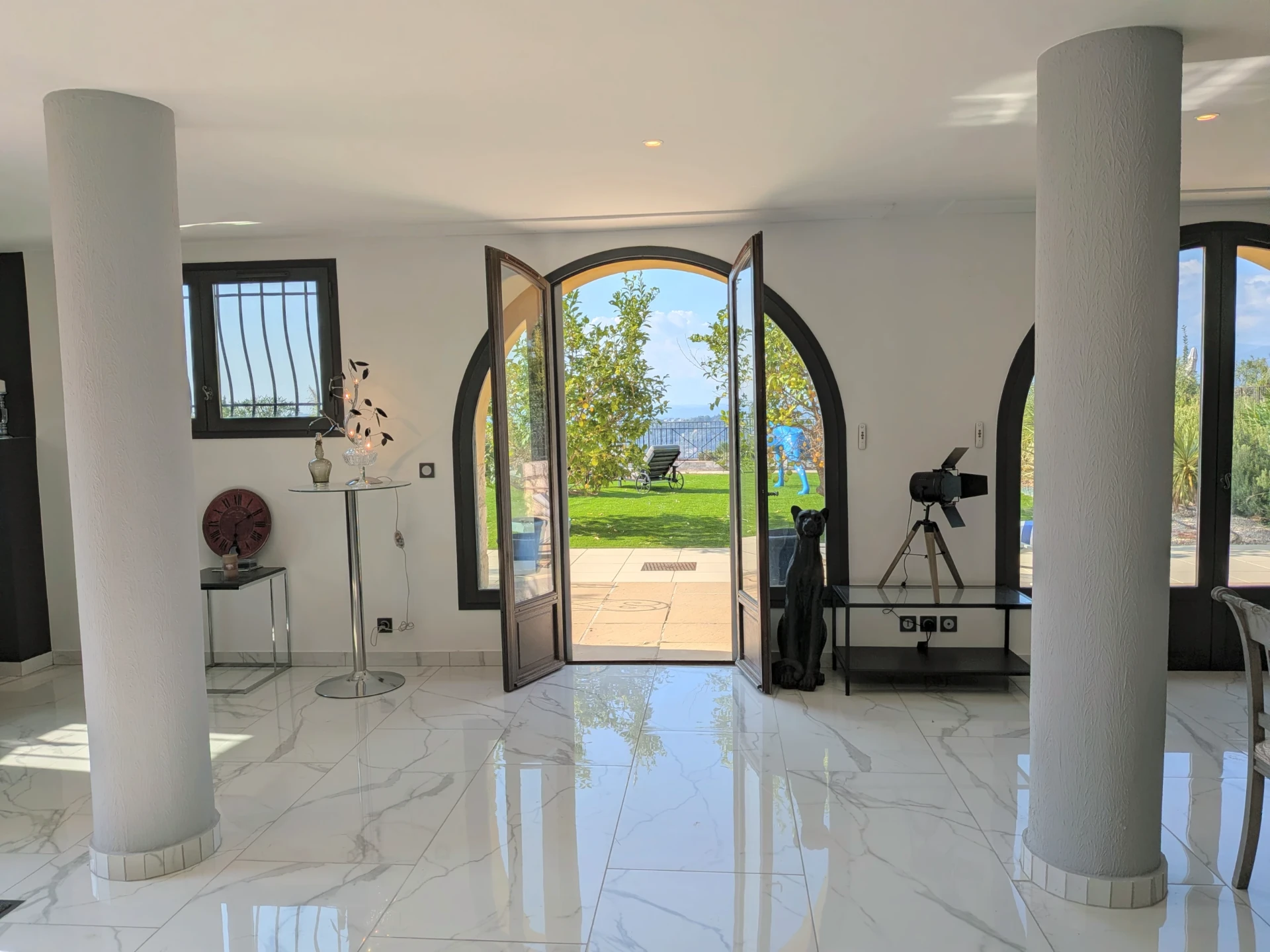 Doors open onto the garden