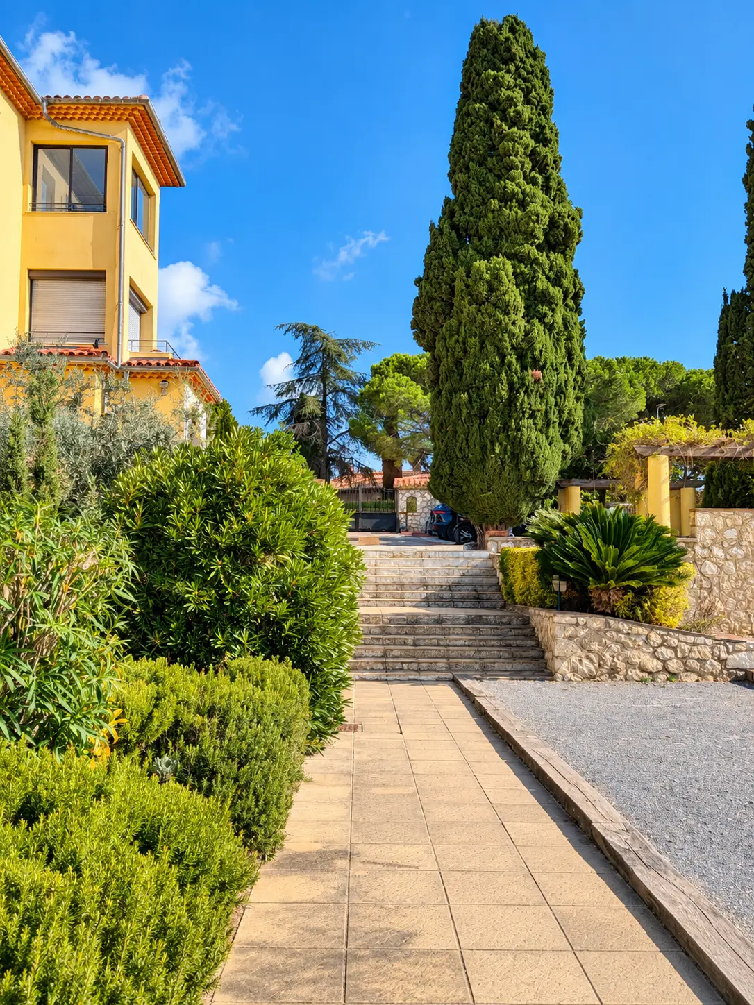 A landscaped path in the residence grounds